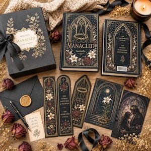May include: A collection of gothic-themed books and accessories. The set includes a book, a collector's edition box, bookmarks, and an envelope with a wax seal. The book covers and box feature floral designs and the title "MANACLED".