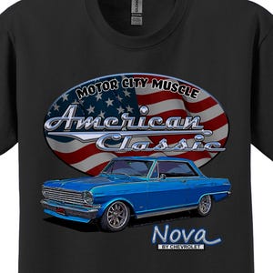 May include: Black t-shirt featuring a blue classic car graphic. The design includes the text "Motor City Muscle American Classic Nova by Chevrolet" with an American flag background.