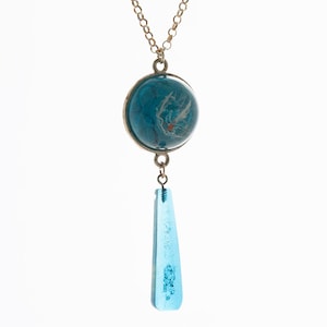 Blue swirl dangle resin pendant necklace