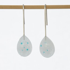 White and blue polka dot earrings