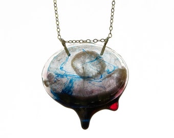 Flat oval resin drip pendant