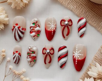 Uñas postizas navideñas 3D rojas y blancas con forma de bastón de caramelo / Uñas decoradas a mano con cinta navideña y copos de nieve / Regalo festivo para mujer