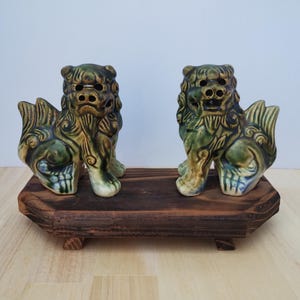 Vintage Okinawan Shisa Guardian Lion Pair | Green-Blue Ceramic with Wooden Base | Japanese Home Protection Figurines | 1970s–80s