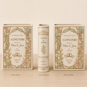 May include: A set of two rectangular ceramic book-shaped vases and one central book-shaped spine piece. The front and back feature a stained-glass style border with pink and green floral motifs, text reading A LOVE STORY, Olivia & James, and 09.26.2026.