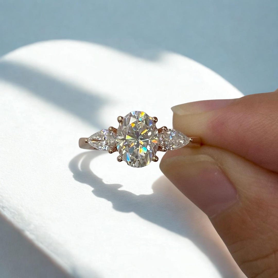 Oval Moissanite Engagement Ring: Pear Cut Sides, 14k Yellow Gold Three ...