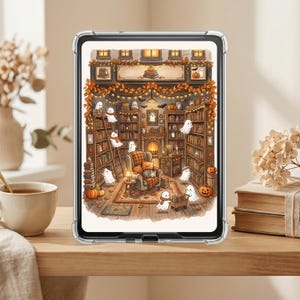 May include: A clear tablet case displaying an illustration of a cosy library filled with books, pumpkins, and small ghosts. The scene features a fireplace, an armchair with a sleeping cat, and shelves decorated with autumn leaves and string lights.