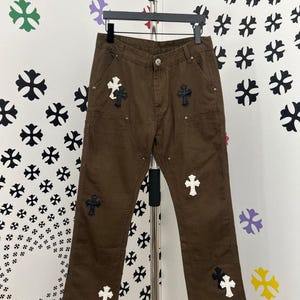 Mens custom made jeans with patches and crosses