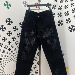 Custom made black jeans with black crosses