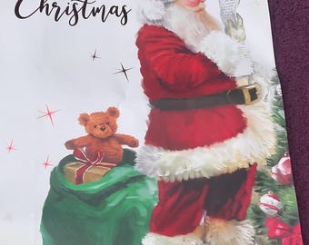 Merry Christmas. He’s checking it twice to see who’s naughty and nice. Santa Claus is coming to town.