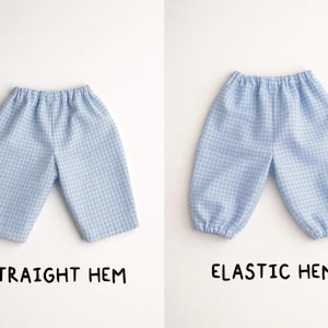 May include: Two pairs of baby pants in a light blue and white gingham pattern. One pair has a straight hem, and the other has an elastic hem. The text below each pair of pants reads "STRAIGHT HEM" and "ELASTIC HEM".