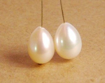 A pair: Full drill 10mm x 8.5mm grade  AA to AAA tear drop pearls, natural creamy white, genuine cultured fresh water pearls, 20 gauge hole