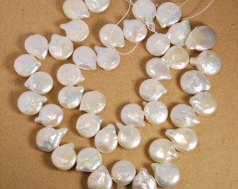 Full 15 inch strand freshwater pearl,  coin pearl with tails, head drilled, grade AA, natural white color