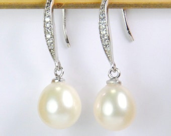 One pair: 11mm grade AAA fresh water pearl ear stud earrings, pearl post earrings, with sterling silver post, white color