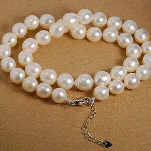 Genuine freshwater pearl necklace,10-11mm rice pearl, off-round pearl, hand knotted, 17 inch plus 1.5 inch extension, grade A, natural white