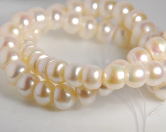 10 pcs: cultured freshwater pearls, 9x7mm button shape, grade A to AA, natural white color