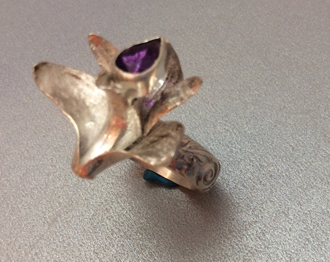 Sterling silver orchid ring with pear shape amethyst center