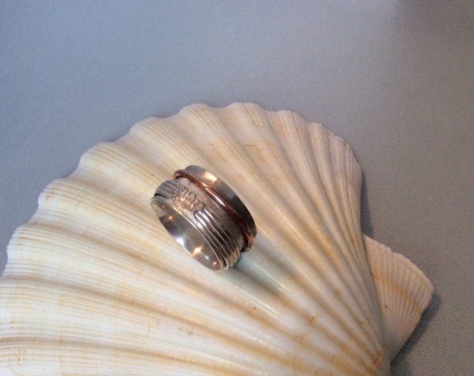 Sterling silver spinner ring with copper and silver band