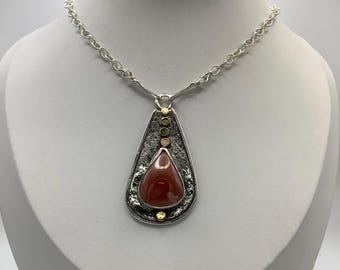 Brazilian Ruby Stone set in Yellow Gold silver