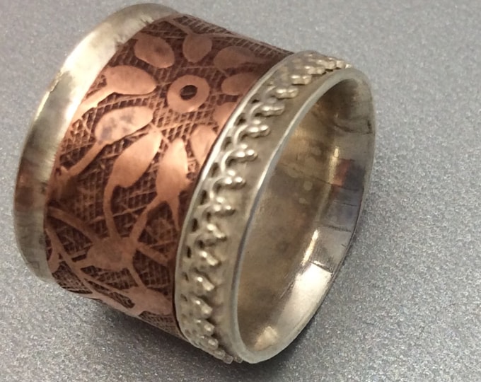 Sterling silver spinner ring with copper and Sterling spinners