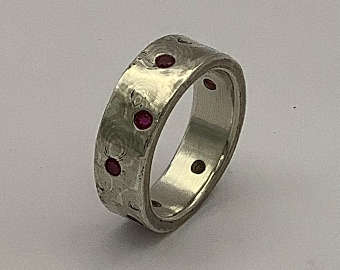 Mokume Gane with garnet gypsy set stones