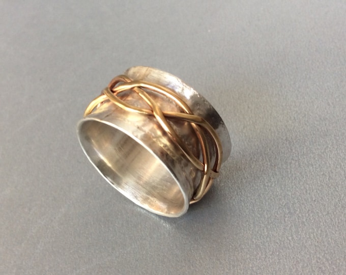 Sterling silver spinner ring with brass free form spinner band