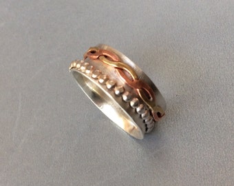 Sterling silver spinner ring with copper and brass spinner