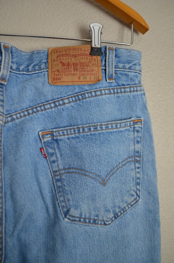 vintage 80s medium to light wash 550 Levi's jeans… - image 9