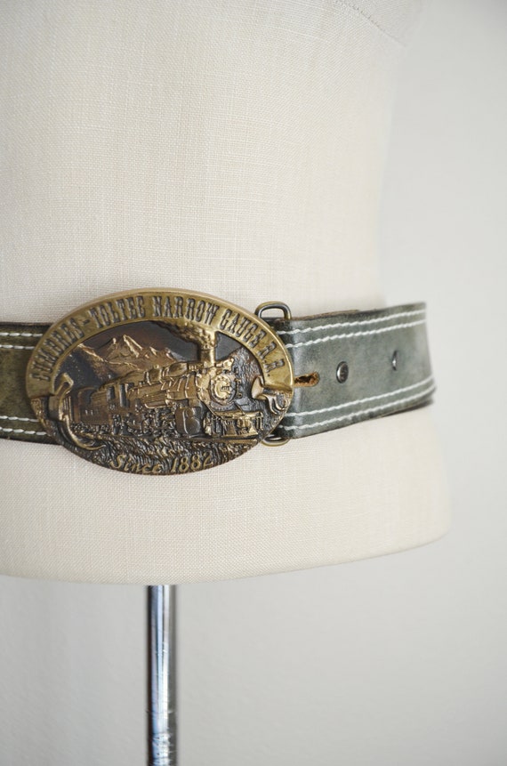 green leather belt / vintage Cumbres & Toltec Buck