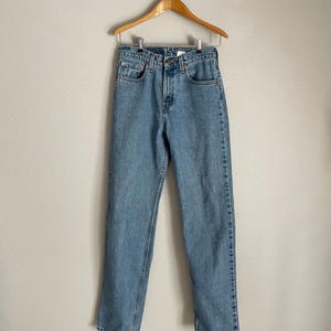 Vintage 90s Levi&#39;s 560 Jeans: Light Wash Baggy Fit, USA Made