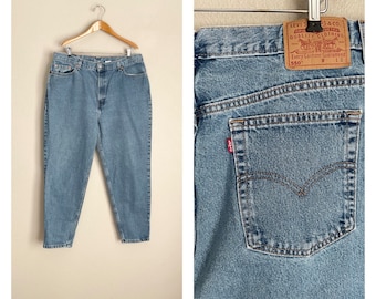 vintage 80s Levi's 550 high waisted relaxed fit tapered leg mom jeans usa made medium wash denim -- womens 36x28- 35/36 550s