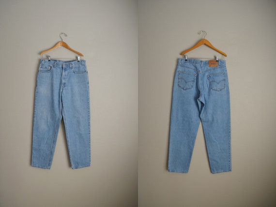 vintage 80s medium to light wash 550 Levi's jeans… - image 1