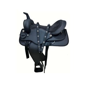 May include: A black Western saddle with a high cantle and a horn. The saddle features silver-colored conchos and a dark suede seat. Leather straps and stirrups are visible, designed for horseback riding.