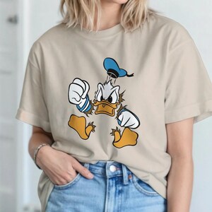 面白いドナルドダックシャツ、ヴィンテージディズニーシャツ、レトロなドナルドTシャツ、ディズニー漫画キャラクターシャツ、ディズニーファンへのギフト、ディズニーワールドTシャツ