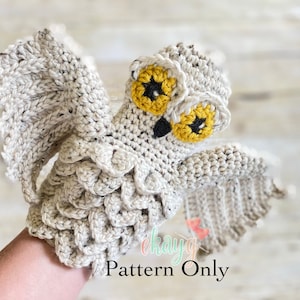 May include: Crochet pattern for a white owl puppet with yellow eyes and black beak. The pattern is called "Pattern Only".