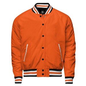 May include: Orange varsity jacket with black snap buttons, white pocket trim, and a striped collar and cuffs. The jacket features a star logo on the collar and a classic bomber style.