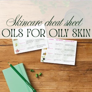 May include: A wooden table displays a skincare cheat sheet titled "Oils for Oily Skin." The image includes a mint green notebook, a green pencil, and push pins. Two informational cards are also present.
