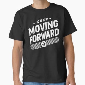 May include: Black t-shirt with the white text "KEEP MOVING FORWARD". The text is in a bold, stylized font with an arrow graphic. The shirt is a classic crew neck style.