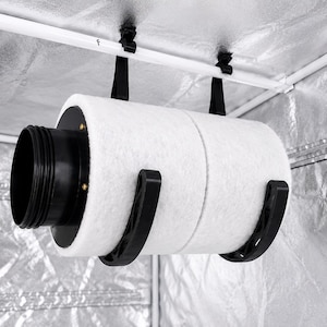 May include: A cylindrical white air carbon filter with a black plastic intake port, suspended by two black straps from a white frame. The filter features a white fibrous exterior and is held in place by two black curved plastic mounting brackets.