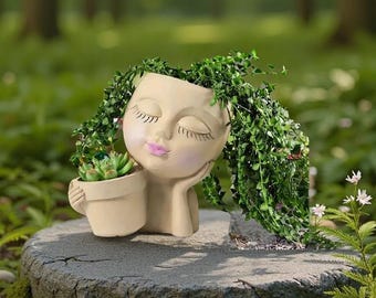 Maceta de pared con forma de rostro femenino, con ojos cerrados. Ideal para plantas suculentas y cactus. Decoración moderna y estética para el hogar. Regalo ideal.