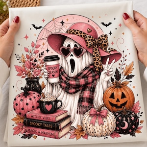 May include: A white fabric print featuring a ghost wearing a pink leopard-print hat, heart-shaped sunglasses, and a plaid scarf. The ghost holds a coffee cup labeled Spooky Season, next to a stack of books titled Witchy Vibes, Spooky Tales, and Magic & Mayhem, surrounded by pumpkins, autumn leaves, and bats.