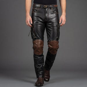 May include: Black leather trousers with brown knee patches, cargo pockets, and a brown belt. The trousers have a classic design with a modern twist, suitable for a biker or a fashion-forward individual.