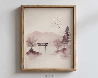 Op de afbeelding: Ingelijste kunstdruk met een serene Japanse landschap in gedempte tinten. Het kunstwerk toont een traditionele torii-poort, bomen en bergen gehuld in mist. De print is ingelijst in een natuurlijke houten lijst, met de tekst "MISTY MOOD ART" onderaan.