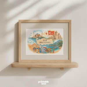 以下が含まれることがあります： トルコの風景を描いた水彩画のフレーム入りプリント。モスク、熱気球、トルコ国旗などの象徴的なランドマークが描かれています。「TURKEY」の文字がカラフルに書かれ、その上に「FOR AN UNFORGETTABLE TRIP」というフレーズがあります。プリントは木製のフレームに入っています。
