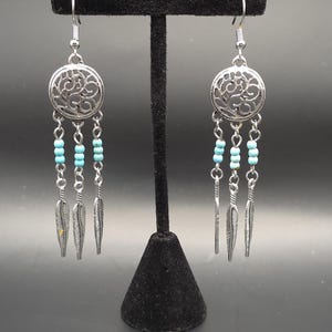 Boho Dreamcatcher Earrings: Turquoise Beads & Silver Feathers
