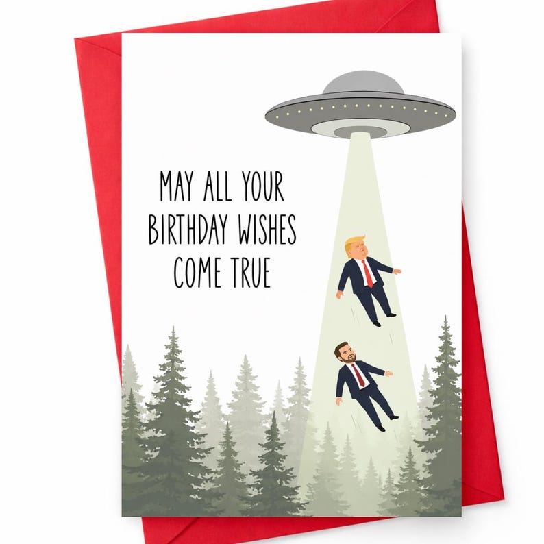May include: A white birthday greeting card featuring a gray UFO hovering over a forest of green pine trees. A beam of light shines down, lifting two figures in dark suits and red ties. The text reads, MAY ALL YOUR BIRTHDAY WISHES COME TRUE.