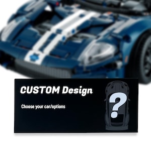May include: A blue and white toy sports car model with a black rectangular sign in the foreground. The sign features the white text CUSTOM Design, the text Choose your car/options, and a graphic of a car silhouette with a large white question mark.