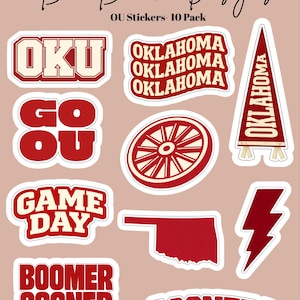 May include: A collection of ten stickers with a cream and red color scheme. The stickers feature phrases like "OKU", "Go OU", "Game Day", and "Boomer Sooner", along with the word "Oklahoma" and a map of the state.