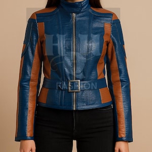 May include: A blue and brown leather jacket with a high collar and a belt. The jacket has brown accents on the shoulders and sides. The zipper is silver. The word "RASHON" is visible on the jacket.