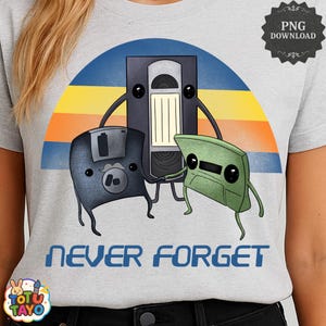 May include: A light grey t-shirt with a retro design featuring a VHS tape, a floppy disk, and a cassette tape, each with cartoon faces. The blue text "NEVER FORGET" is printed below the graphic. The design is set against a sunset-coloured background.