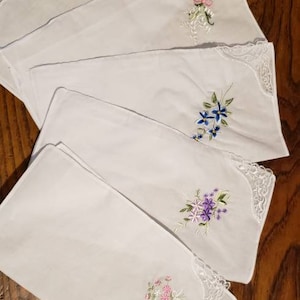 Lovely white  handkerchiefs with embroidery and lace on one corner; cotton; colors of flowers will vary; set of 5